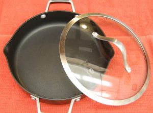 A ten inch non stick skillet with lid.  A must have in the kitchen