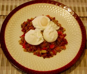 Home made corn beef has and poached eggs. 