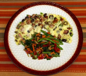 Ham and olive frittata with mixed vegetables. 