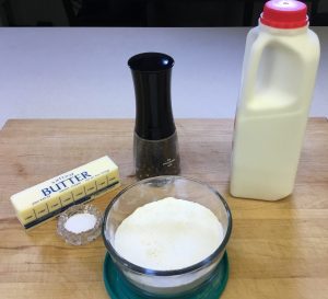 The five basic things you need for a white sauce:  butter, flour, salt, pepper, and milk