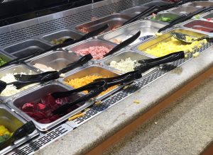 Salad bars provide a quick option for baked potato toppings